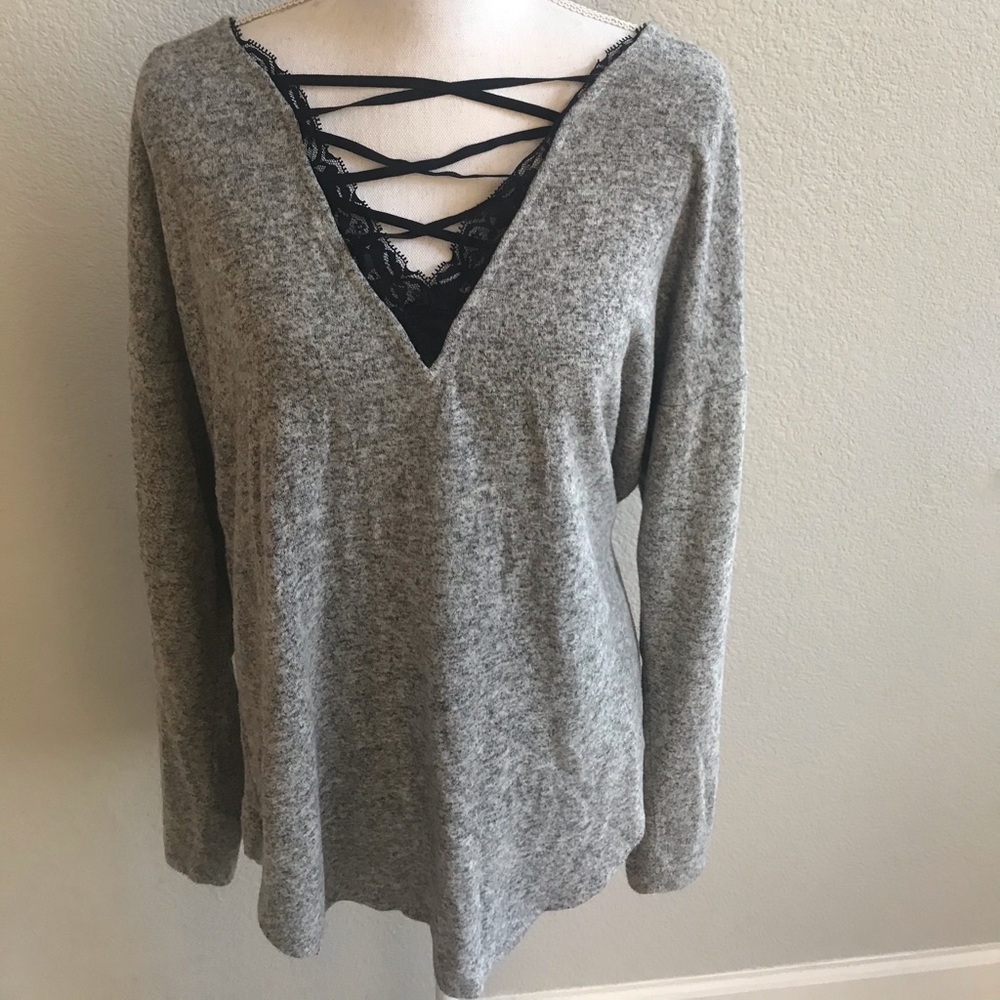 Cute gray sweater with black ribbon details
